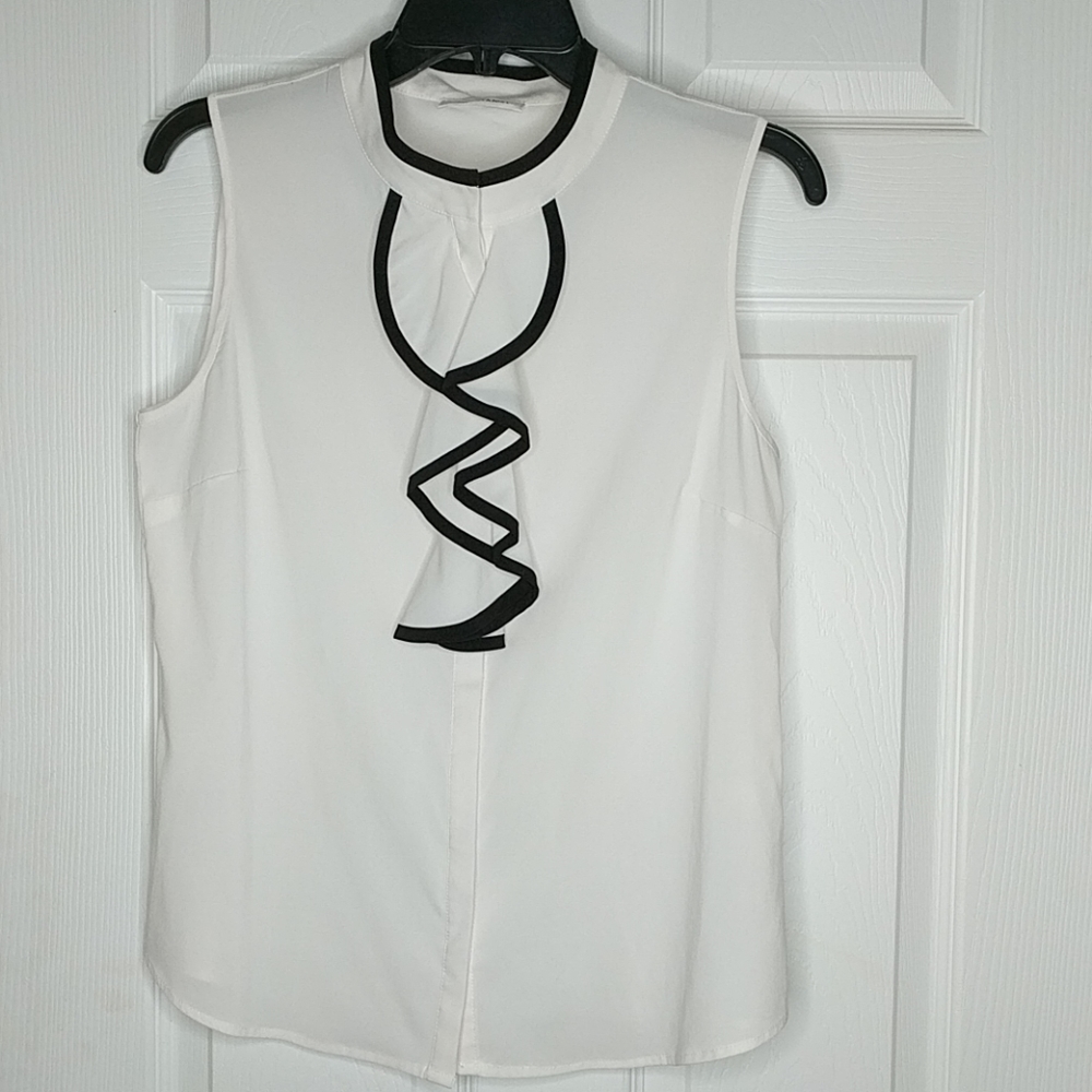 White sleeveless blouse